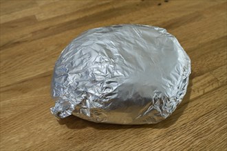Doener kebab wrapped in aluminium foil