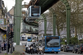 Transport with suspension railway, bus, cars and motorbikes in Vohwinkel, Wuppertal, Bergisches