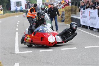 Motorbike with sidecar and focus on the racers in competition, SOLITUDE REVIVAL 2011, Stuttgart,