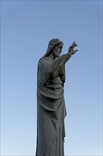 Church of Notre-Dame de la Garde, Marseille, Statue of a religious character against a clear sky,