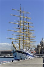 Marseille harbour, A large sailing ship in the harbour against a clear sky, an attraction for