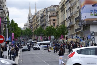 Marseille, View of a busy city street with passers-by and traffic, Marseille, Departement