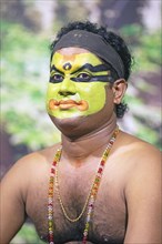 Kathakali performer or mime, 38 years old, with painted face, Kochi Kathakali Centre, Kochi,