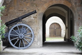 Langenburg Castle, An old cannon in front of a passageway in a historic building, Langenburg
