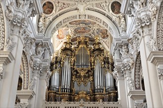 St Stephen's Cathedral, Passau, detailed view of a baroque church organ with golden decoration, St