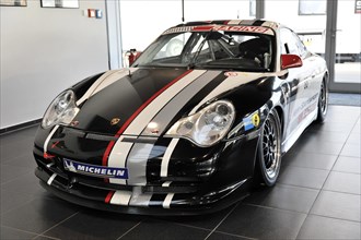 A Porsche 911 racing car with advertising livery and Michelin sponsorship, Schwaebisch Gmuend,