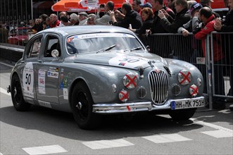 A silver vintage-style racing car in front of a crowd, SOLITUDE REVIVAL 2011, Stuttgart,