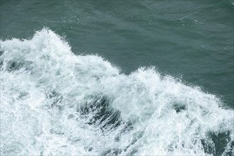 Bow wave of a ferry, spray, Irish Sea near Dublin, Republic of Ireland