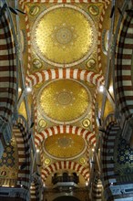 Church of Notre-Dame de la Garde, Marseille, interior view of a church with a golden dome and
