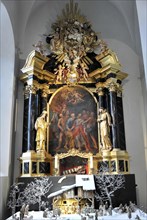 The Neumuenster Collegiate Abbey, Diocese of Wuerzburg, Wuerzburg, A richly decorated baroque altar