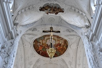 In the Neumuenster collegiate monastery, Wuerzburg, depiction of the crucifixion of Christ under a