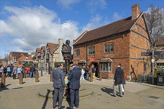 William Shakespeare statue, on the left behind his birthplace, Stratford upon Avon, England, Great