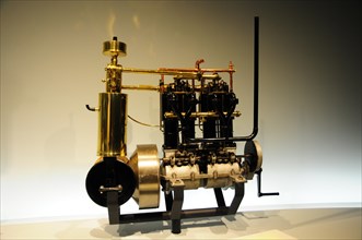 Detailed photograph of a historic engine from the early days of mechanical engineering,