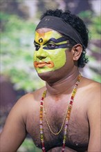 Kathakali performer or mime, 38 years old, with painted face, Kochi Kathakali Centre, Kochi,
