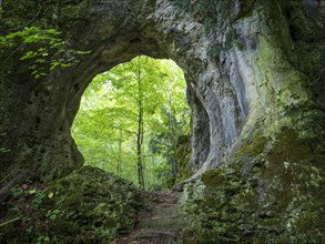 Hiking trail leads through a rock gate, Goessweinstein, Franconian Switzerland, Upper Franconia,