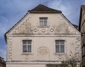 House facade with inscription: German house, German country, God protect you with a strong hand,