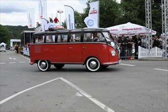 VW Samba Bus, built in 1953, side view of a classic red VW bus at an event, SOLITUDE REVIVAL 2011,