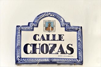 Solabrena, A traditional blue and white ceramic sign shows the street name 'Calle Chozas',