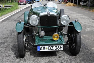 Morris 8, A detailed green vintage car with yellow headlights, SOLITUDE REVIVAL 2011, Stuttgart,