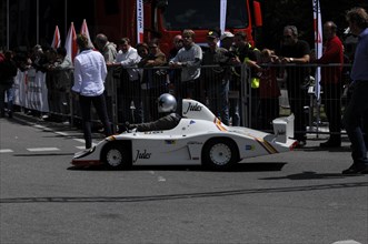Small white racing car on a secured race track during a race, SOLITUDE REVIVAL 2011, Stuttgart,