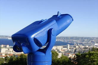 Blue telescope overlooking the city from a high vantage point, Marseille, Departement