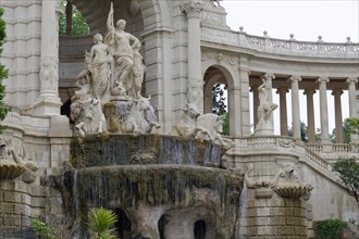Palais Longchamp, Marseille, Detailed fountain with figures and columns under an ornamented