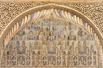 Artistic stone carvings, Alhambra, Granada, A detailed Islamic stone carving with arches and