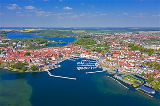 Aerial view over Waren, town and climatic spa on the shores of Lake Mueritz in summer,