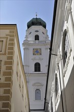 St Stephan Cathedral, Passau, church tower with dome, clock and alley on a sunny day, St Stephan