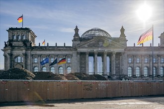 The flag of NATO, Europe and the Federal Republic of Germany photographed at the Reichstag building