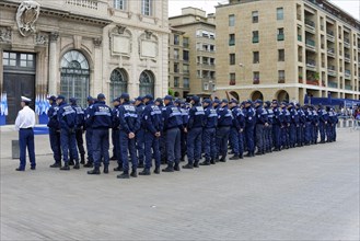 Marseille town hall, policemen in blue uniforms, lined up in a public square, Marseille,