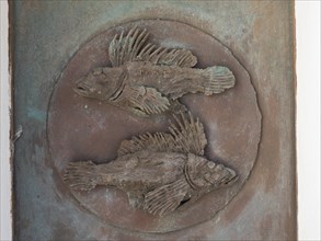 Depiction of fish, sculpture, Stella Maris church, Porto Cervo, Costa Smeralda, Sardinia, Italy,