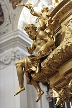 St Stephen's Cathedral, Passau, Golden sculpture of an angel with musical instrument in detail,