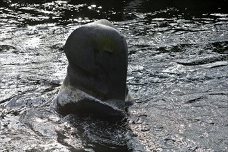 Sculpture by Bernd Bergkemper in the shape of an elephant in the river Wupper, commemorating the