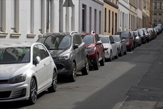Lined up parked cars in a residential street, Vohwinkel, Wuppertal, Bergisches Land, North