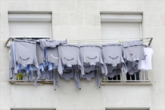 Marseille, row of clothes hanging on a washing line in front of a window, Marseille, Departement