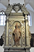 St Kilian's Cathedral, St Kilian's Cathedral, Wuerzburg, Stone statue of a saint in a church niche,