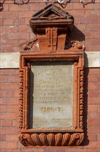Memorial plaque, clock tower, Bangor, Wales, Great Britain