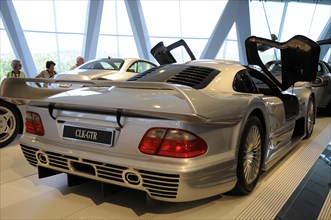 Museum, Mercedes-Benz Museum, Stuttgart, A silver Mercedes-Benz CLK GTR in a car museum with the