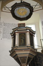 Langenburg Castle, A religiously decorated pulpit with a painting in a church interior, Langenburg