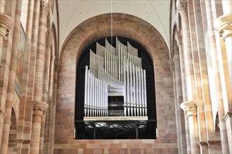 Speyer Cathedral, large church organ behind a grille, flanked by stone pillars, Speyer Cathedral,