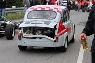 The rear of a white classic car with a visible engine, SOLITUDE REVIVAL 2011, Stuttgart,