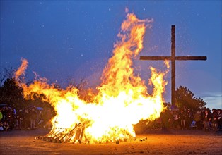 Easter bonfire on the Haniel spoil tip in front of the summit cross, Bottrop, Ruhr area, North