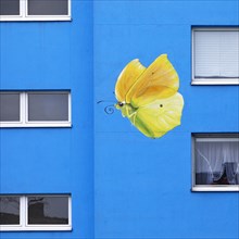 Sunflower house, painted yellow lemon butterfly on a skyscraper, artist Ulrich Allgaier, Wuppertal,
