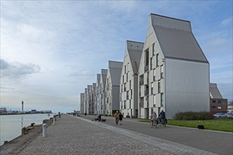 Modern architecture in the harbour, houses, people, lighthouse, Dunkirk, France, Europe