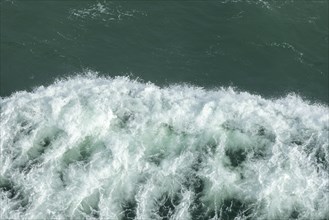 Bow wave of a ferry, spray, Irish Sea near Dublin, Republic of Ireland