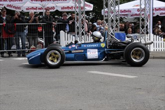 Blue formula racing car at the starting position of a race, driver with helmet visible, SOLITUDE