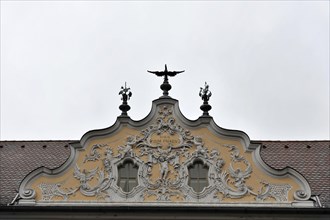 Facade view of the Falkenhaus with stucco facade in rococo style in the centre of Wuerzburg,