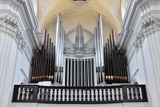 The organ in the Neumuenster collegiate monastery, Wuerzburg, close-up of an organ with many pipes