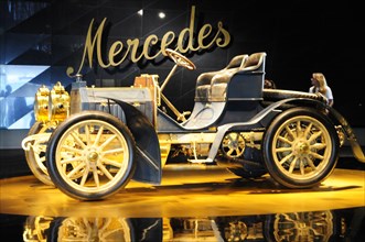 Luxurious vintage Mercedes convertible in shades of gold as an exhibit, Mercedes-Benz Museum,